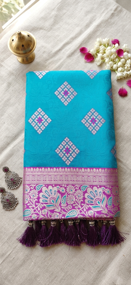 Sky Blue Meenakari Silk Saree with Purple Contrast Border & Tassels